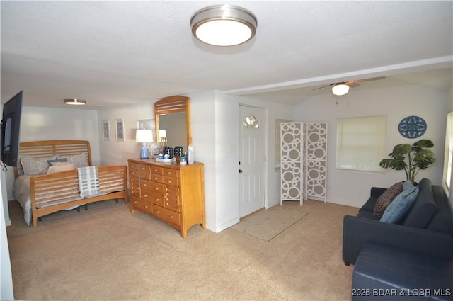 bedroom featuring light carpet