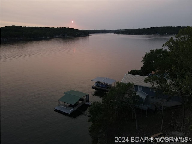 water view featuring a floating dock