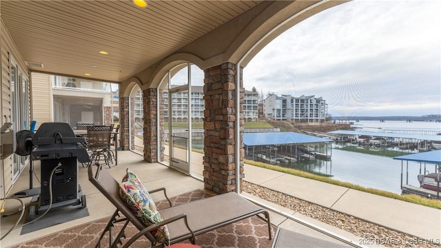 view of patio / terrace with a water view