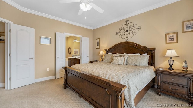 carpeted bedroom with crown molding, ceiling fan, and ensuite bathroom