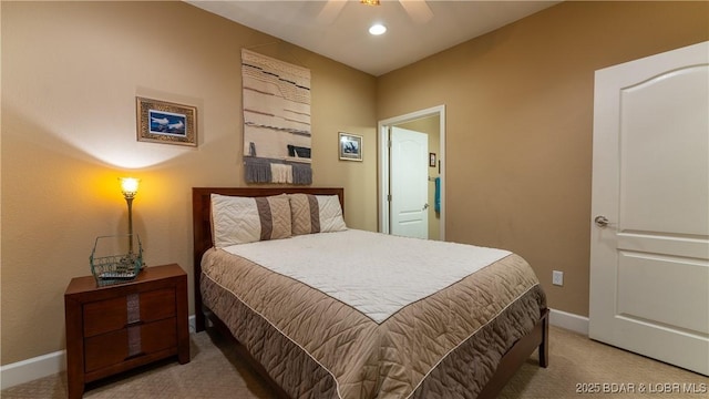 carpeted bedroom featuring ceiling fan