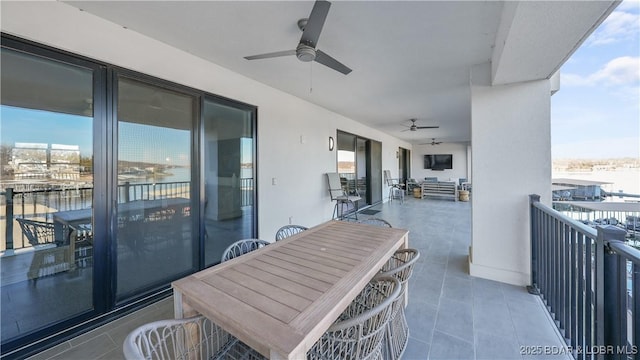 balcony featuring ceiling fan