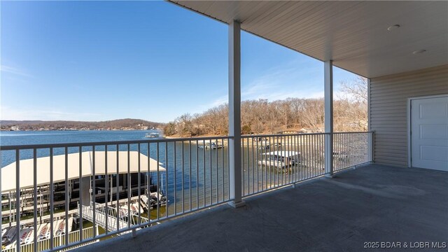 balcony featuring a water view