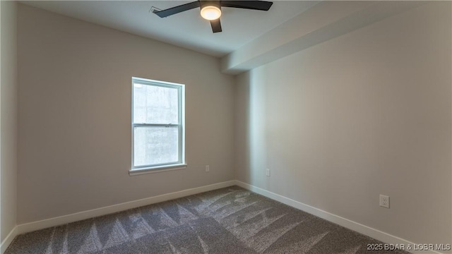 empty room with ceiling fan and carpet flooring