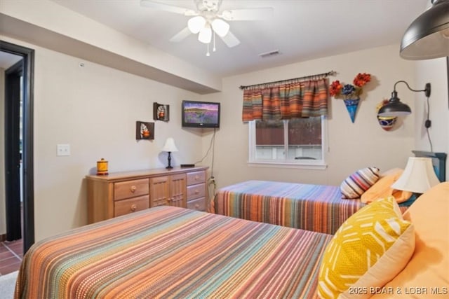 bedroom featuring ceiling fan