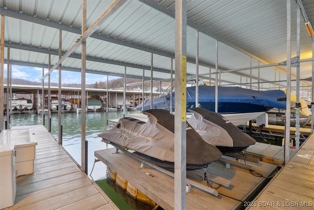 view of dock with a water view