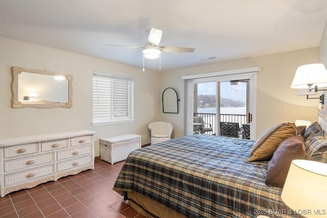 tiled bedroom with access to outside and ceiling fan