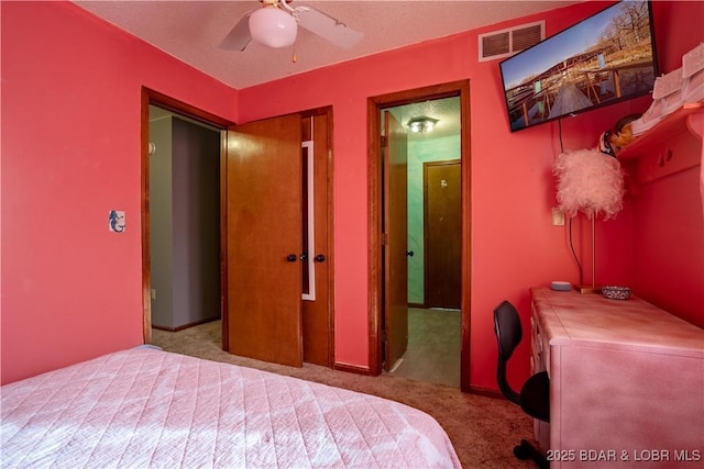 bedroom featuring light carpet and ceiling fan