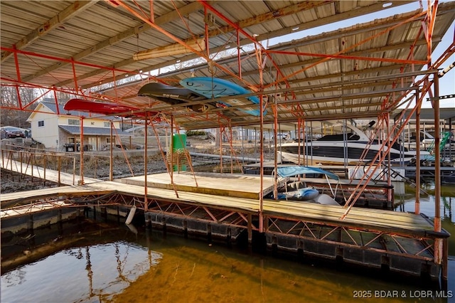 dock area featuring a water view