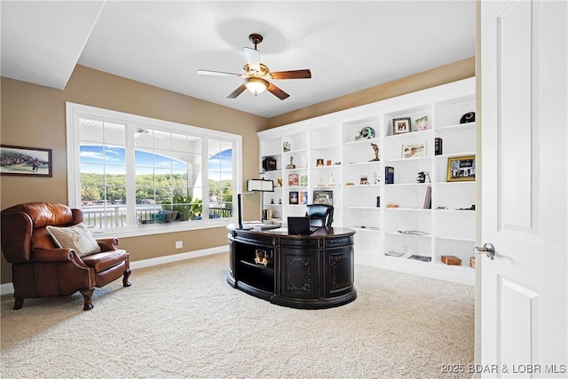 office space with carpet floors and ceiling fan