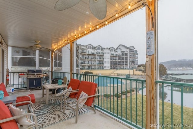 balcony with ceiling fan and grilling area