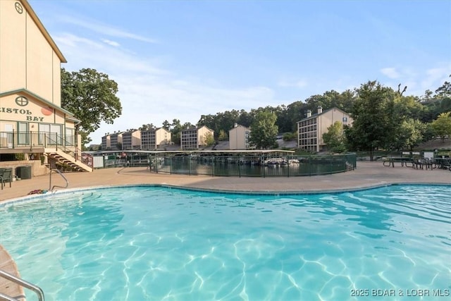 view of pool featuring a patio