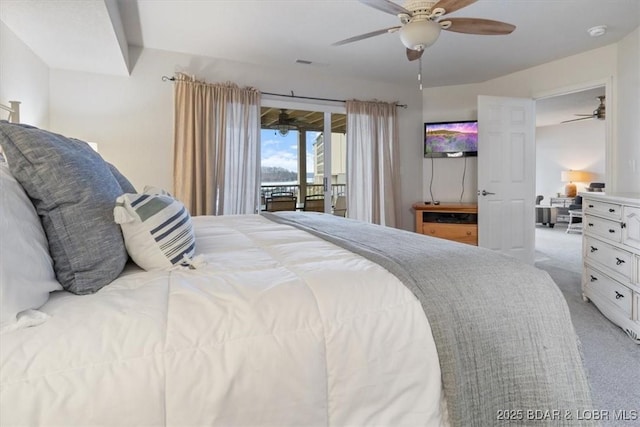 carpeted bedroom featuring ceiling fan and access to exterior