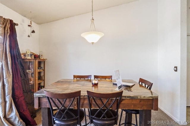 view of carpeted dining room