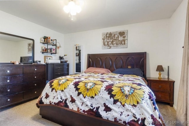 bedroom featuring light carpet