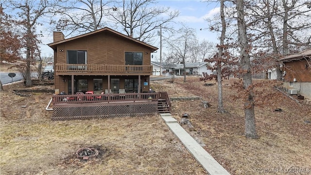 view of front of house featuring a wooden deck