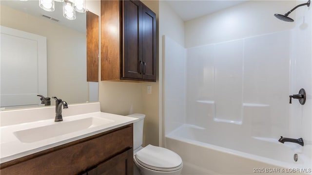 full bathroom featuring  shower combination, toilet, and vanity