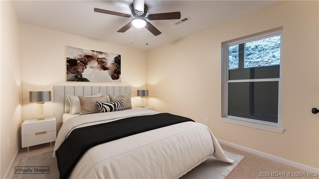 carpeted bedroom featuring ceiling fan