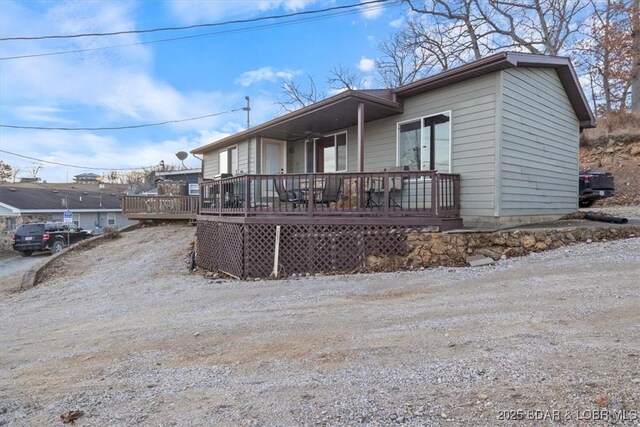 29556 Hunter Rd, Gravois Mills, MO 63069 - ranch-style home with a deck