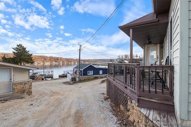 29556 Hunter Rd, Gravois Mills, MO 63069 - view of dirt / gravel driveway with a water view