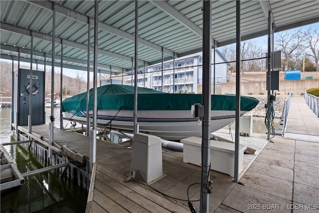 view of dock with a water view