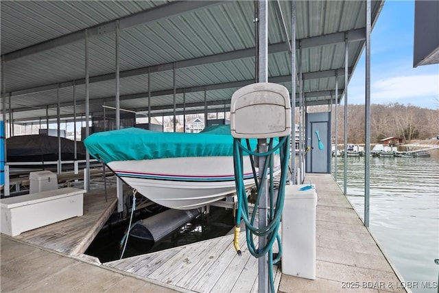 dock area featuring a water view