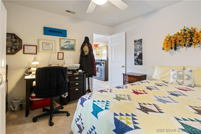 carpeted bedroom featuring ceiling fan