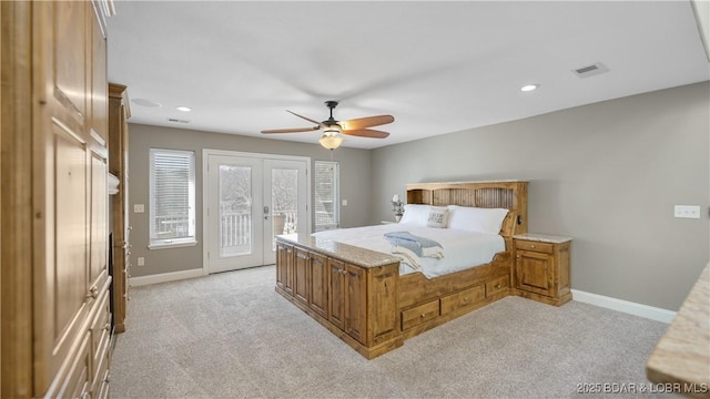 bedroom with french doors, light colored carpet, ceiling fan, and access to outside