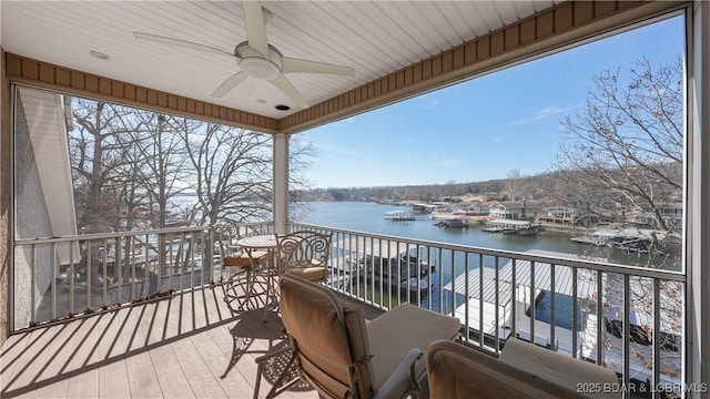 balcony featuring a water view