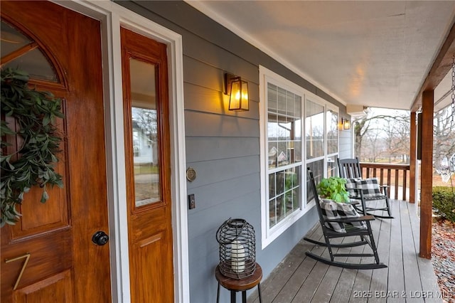 wooden terrace with covered porch