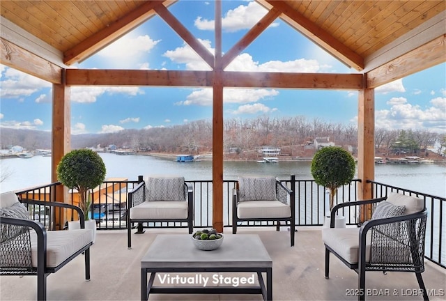 view of patio / terrace featuring a water view and an outdoor hangout area