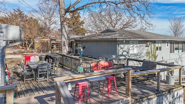 wooden deck with a bar