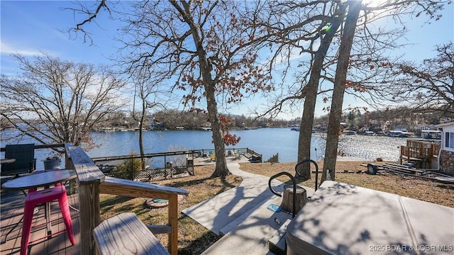 view of patio with a water view