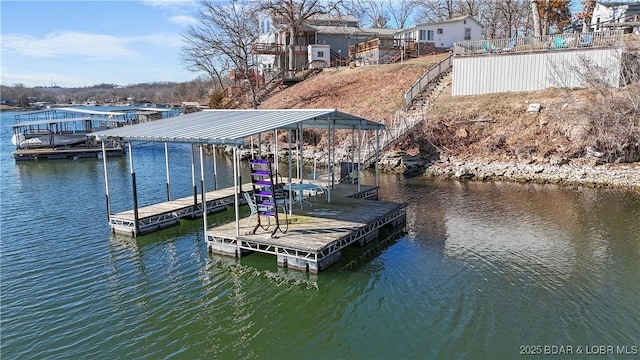 dock area with a water view