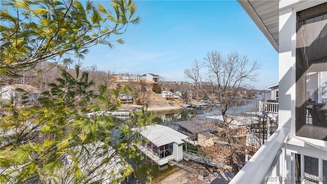 balcony featuring a water view