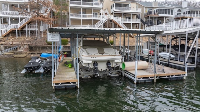 dock area with a water view