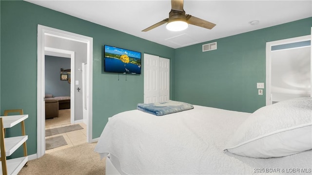 bedroom with carpet floors, a closet, and ceiling fan