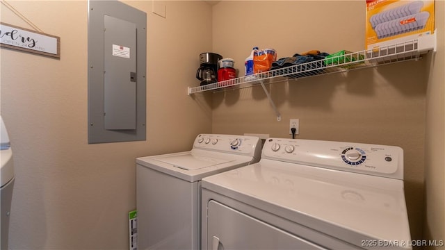 washroom with electric panel and washing machine and dryer