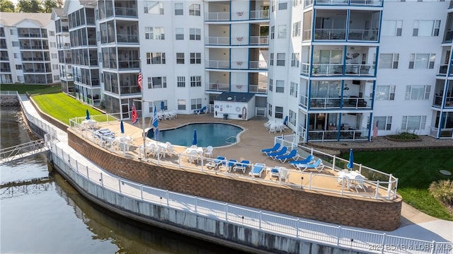 view of pool with a water view