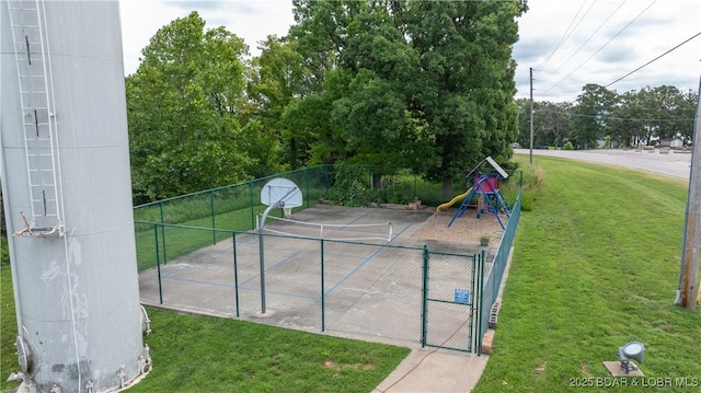 exterior space with a lawn and a playground