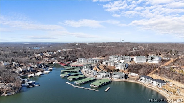 birds eye view of property featuring a water view