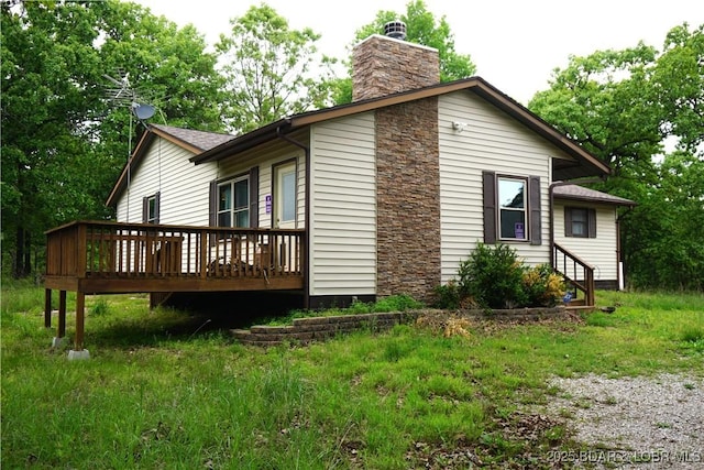 747 Paulson Dr, Edwards, MO 65326 - view of side of property featuring a wooden deck