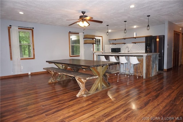 747 Paulson Dr, Edwards, MO 65326 - dining area with dark hardwood / wood-style floors, sink, and ceiling fan