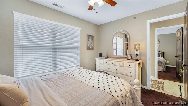 carpeted bedroom featuring ceiling fan