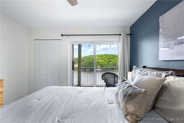 bedroom with ceiling fan and access to outside