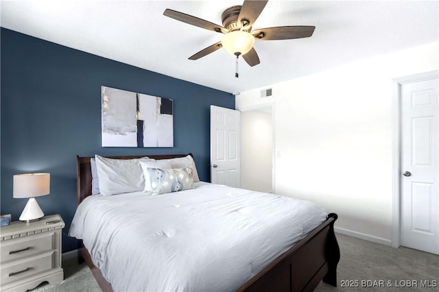 carpeted bedroom featuring ceiling fan