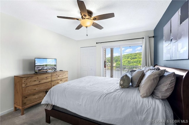 bedroom featuring carpet, access to outside, and ceiling fan