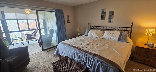 bedroom with access to outside and carpet floors