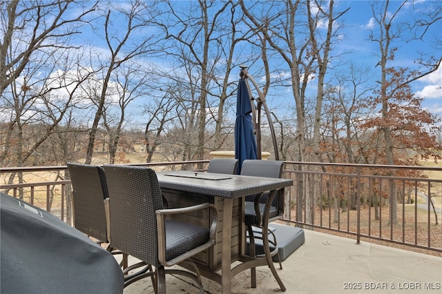 wooden deck featuring a patio area