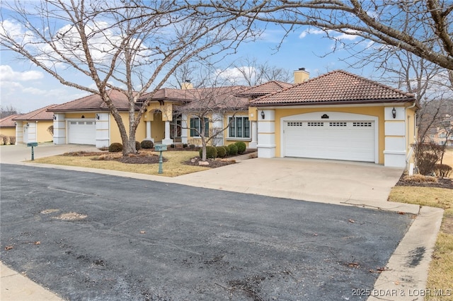 view of front of house with a garage